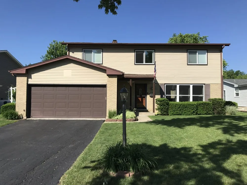 Slide of Butler Roofing