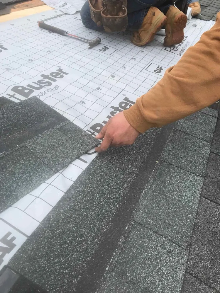 Slide of Butler Roofing