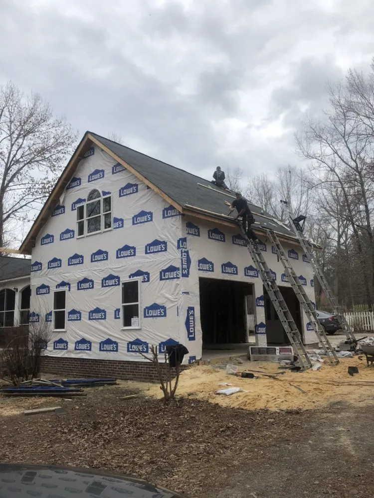 Slide of Butler Roofing