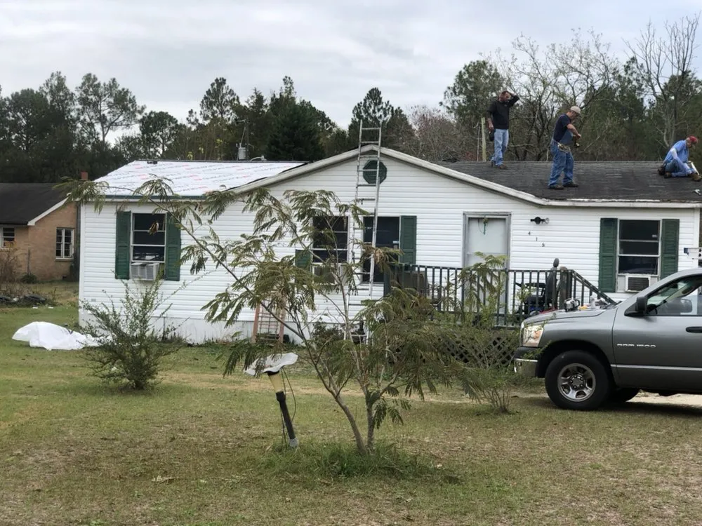 Slide of Butler Roofing