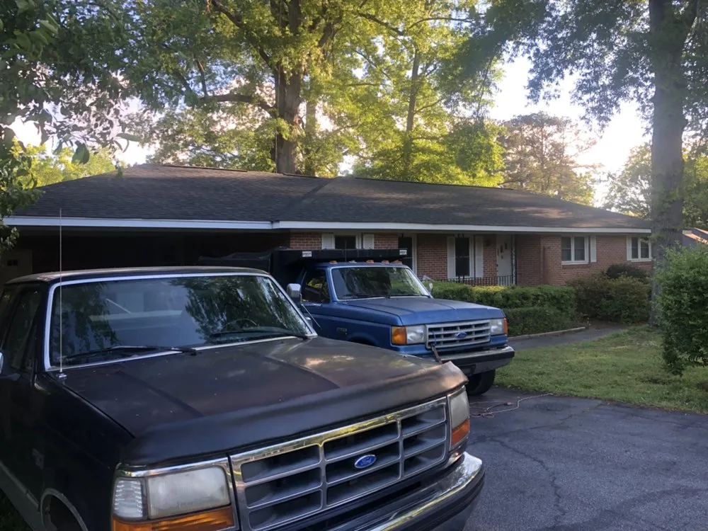 Slide of Butler Roofing