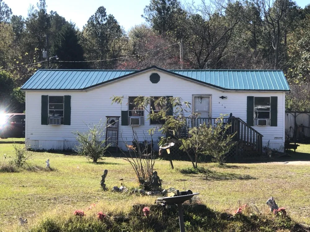 Slide of Butler Roofing