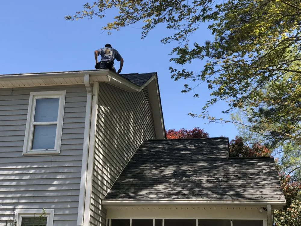 Slide of Butler Roofing