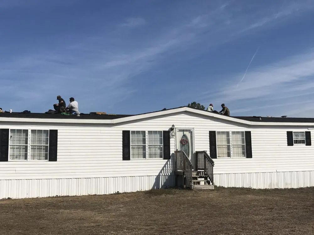 Slide of Butler Roofing