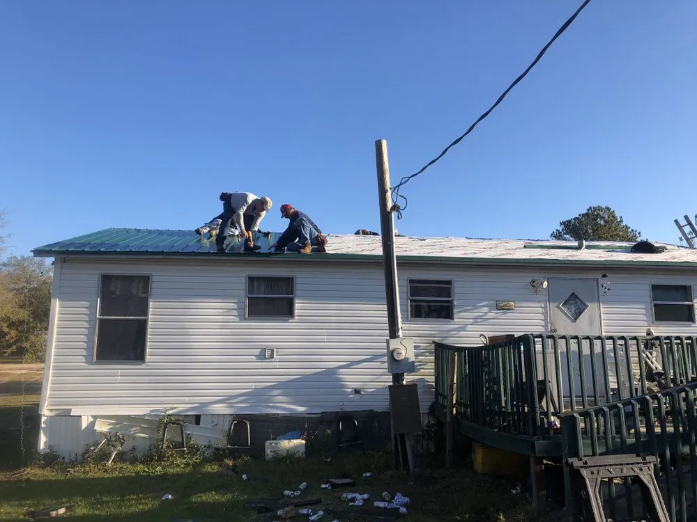 Slide of Butler Roofing