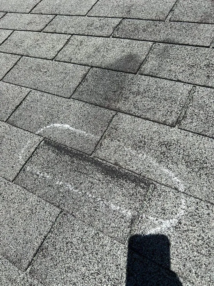 Slide of Buzzell Roofing Service