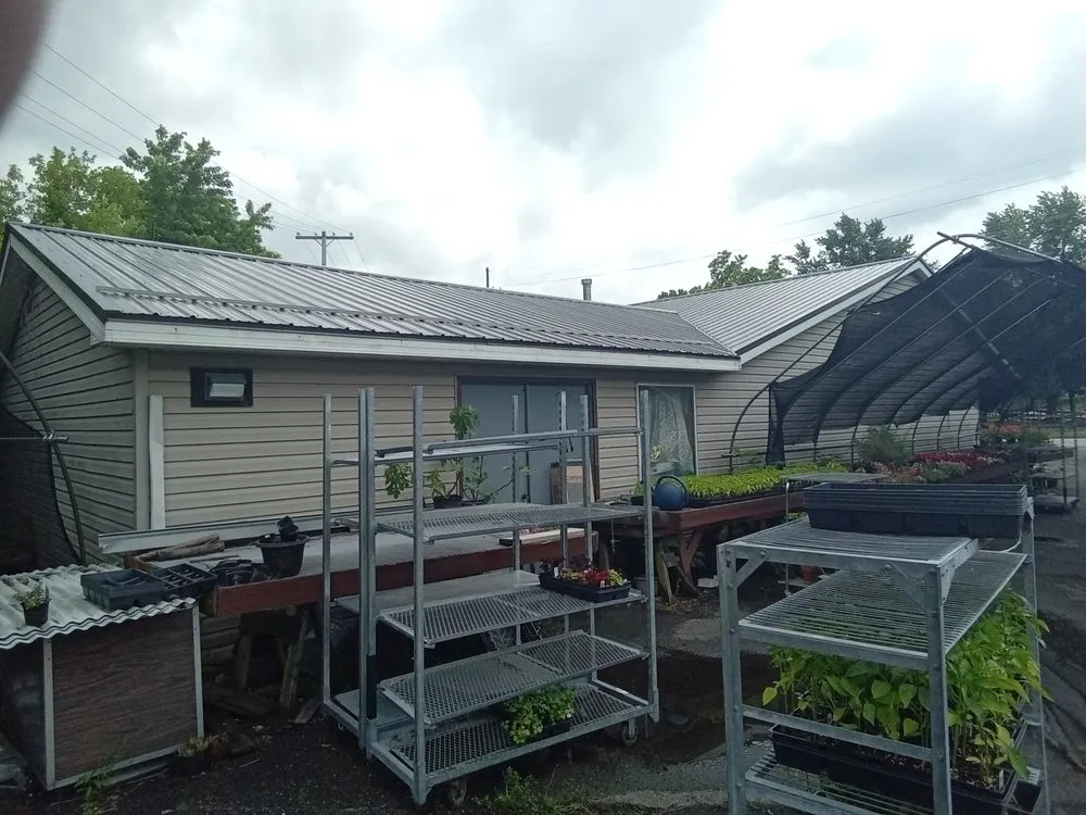 Slide of Byler's Roofing & Construction