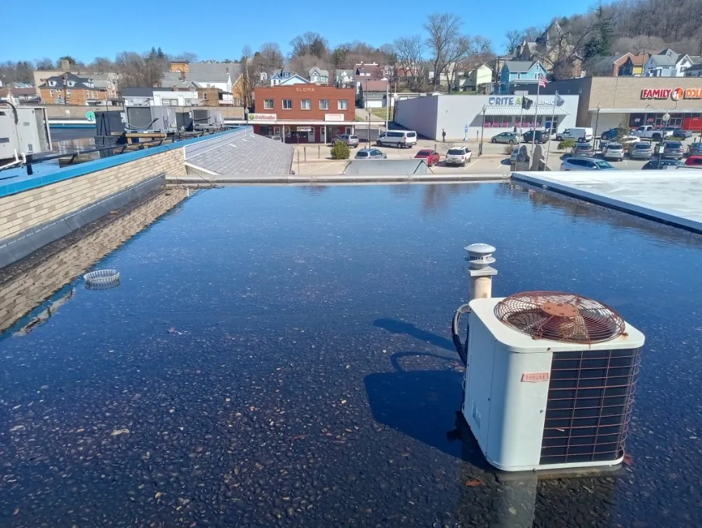 Slide of Byler's Roofing Service