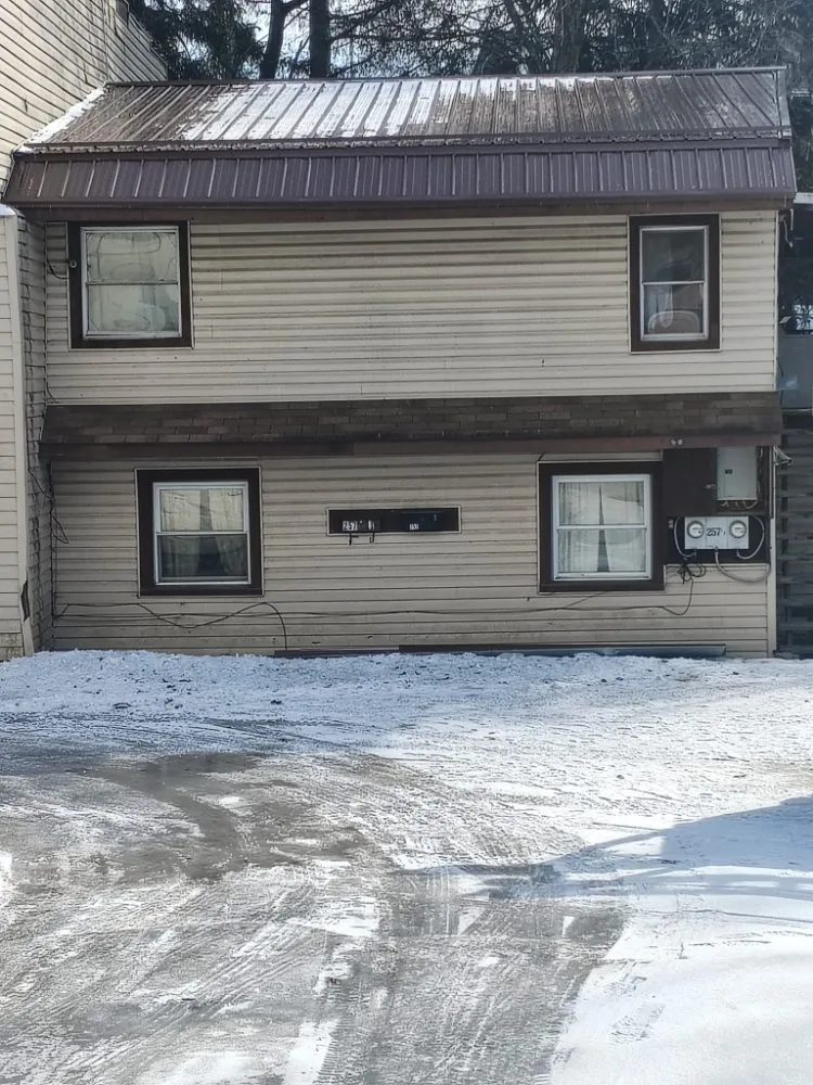 Slide of Byler's Roofing Service