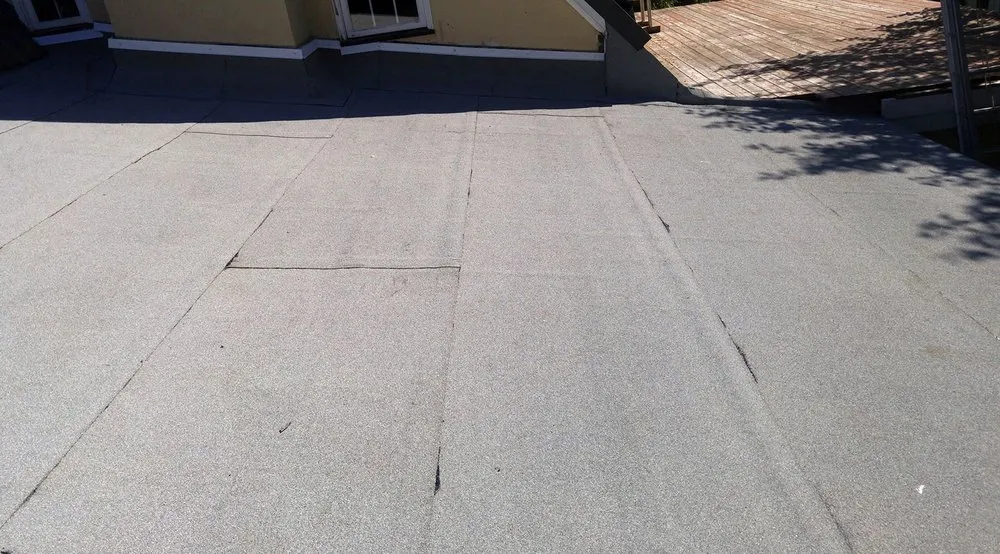 Slide of Bystrom Roofing