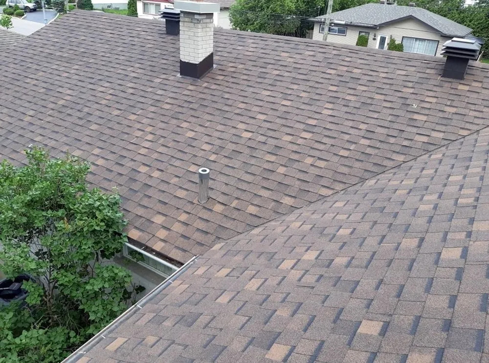 Slide of Bystrom Roofing