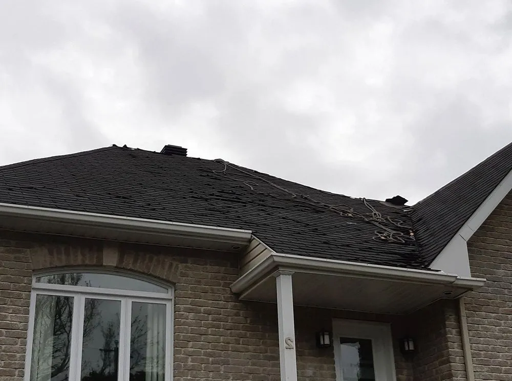 Slide of Bystrom Roofing