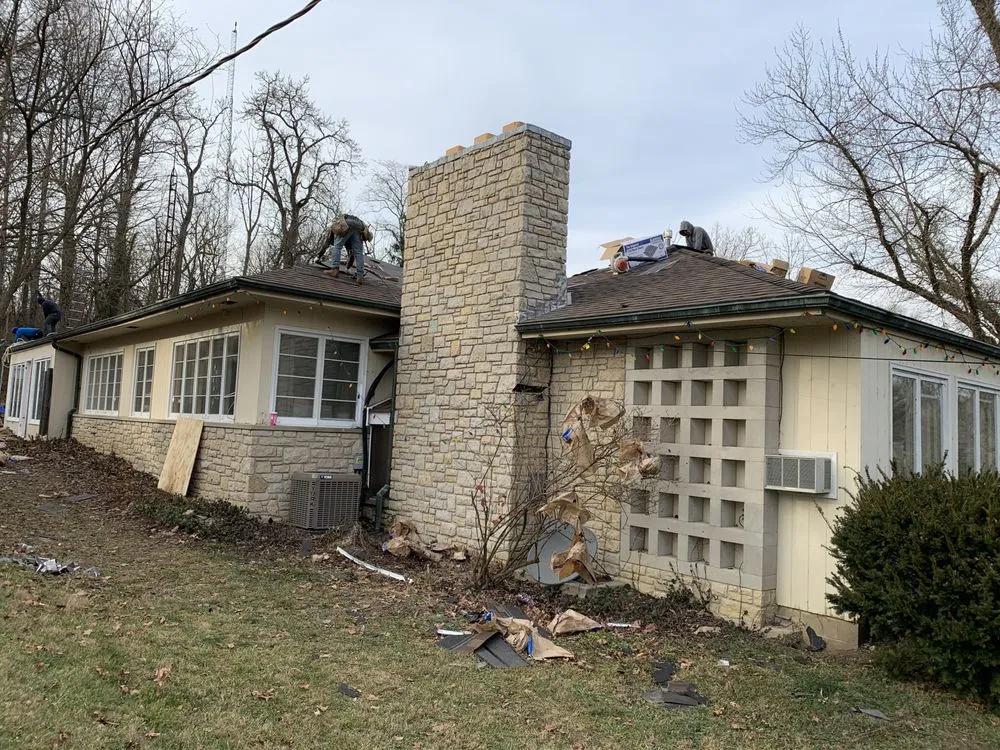 Slide of C & J Roofing