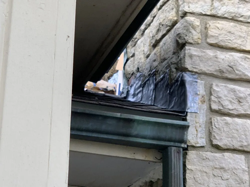 Slide of C & J Roofing