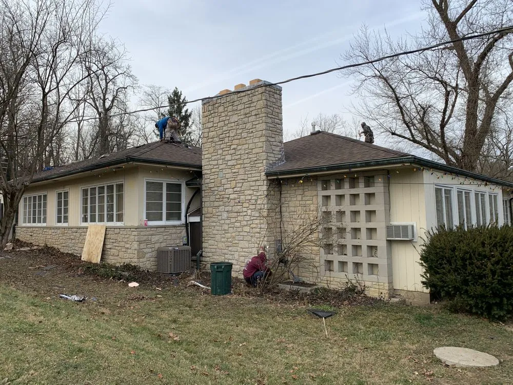 Slide of C & J Roofing