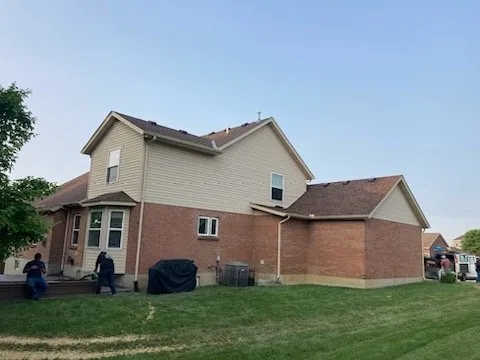 Slide of C & J Roofing