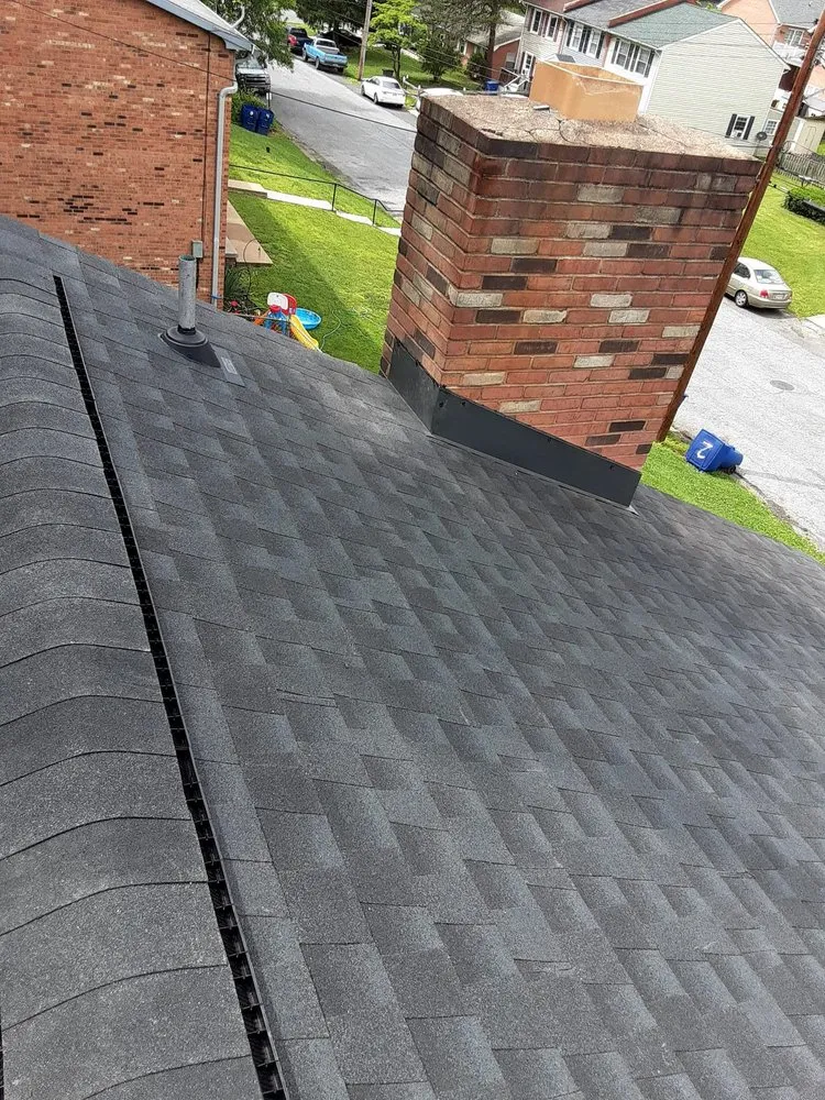 Slide of C & J Roofing