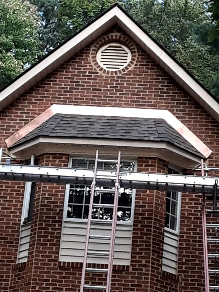 Slide of C & J Roofing