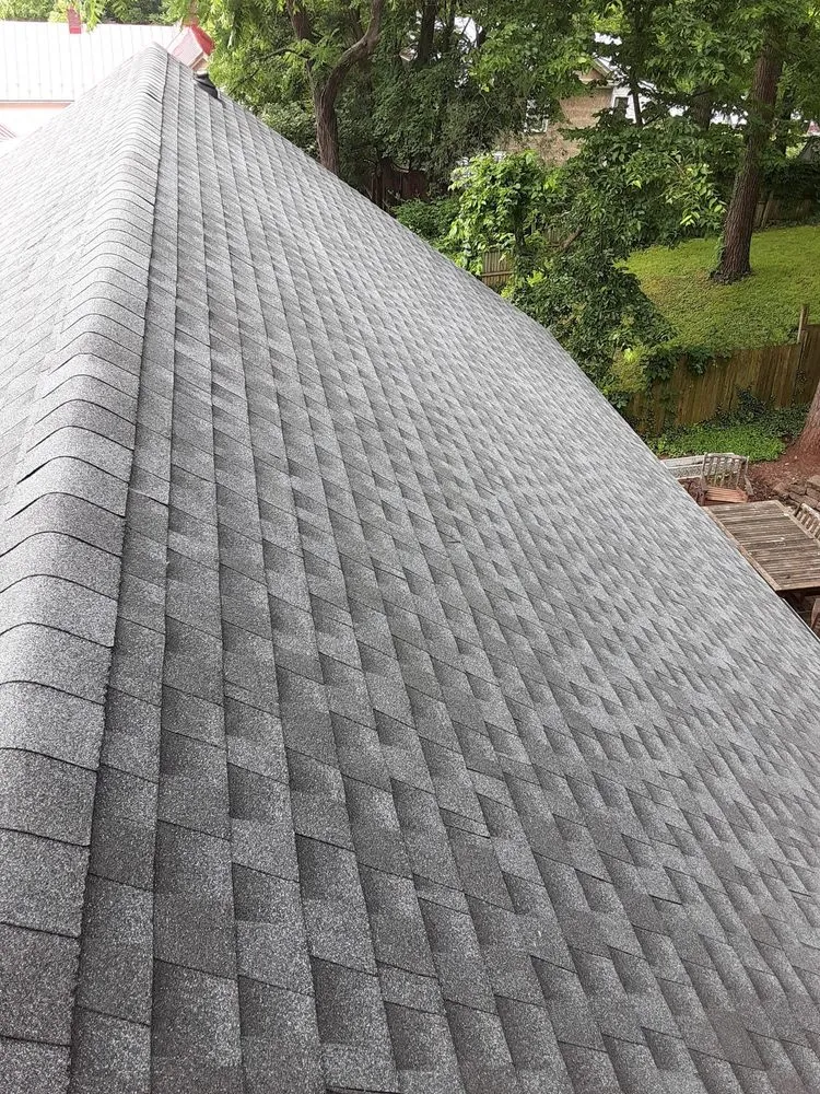 Slide of C & J Roofing