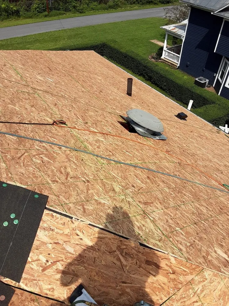 Slide of C & J Roofing