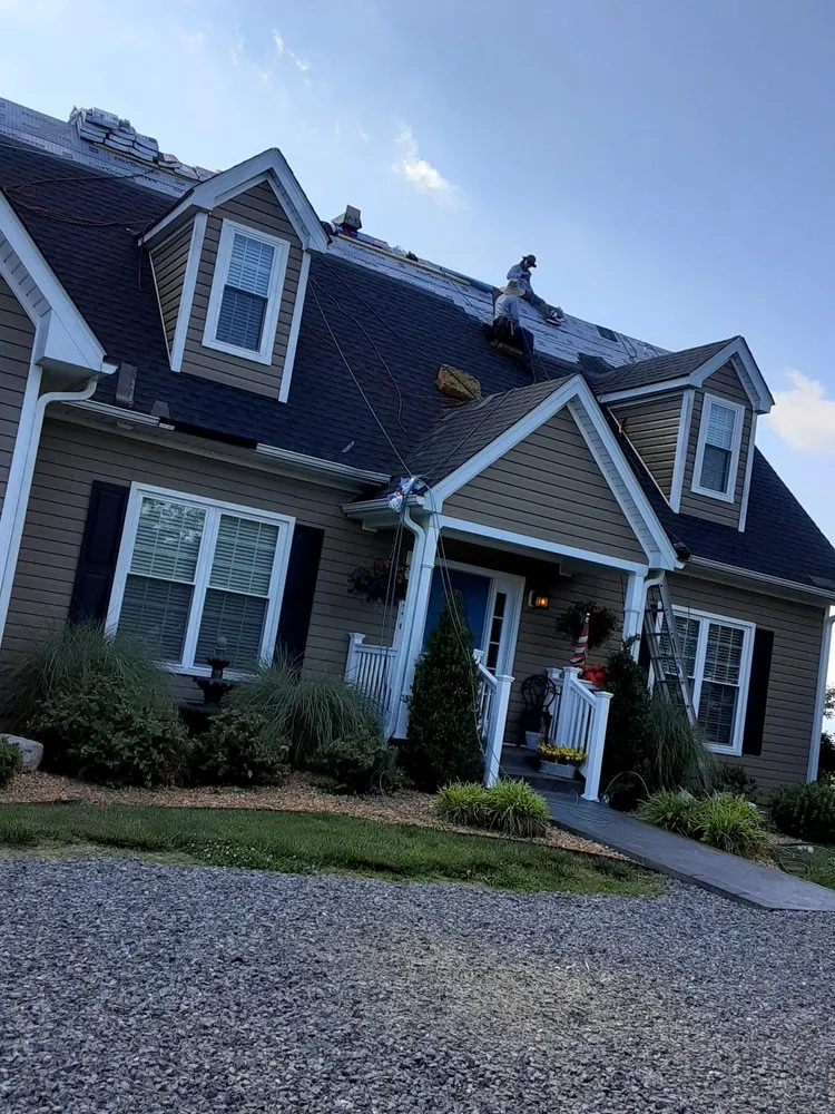 Slide of C & J Roofing