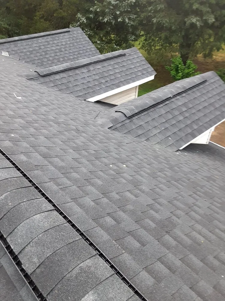 Slide of C & J Roofing