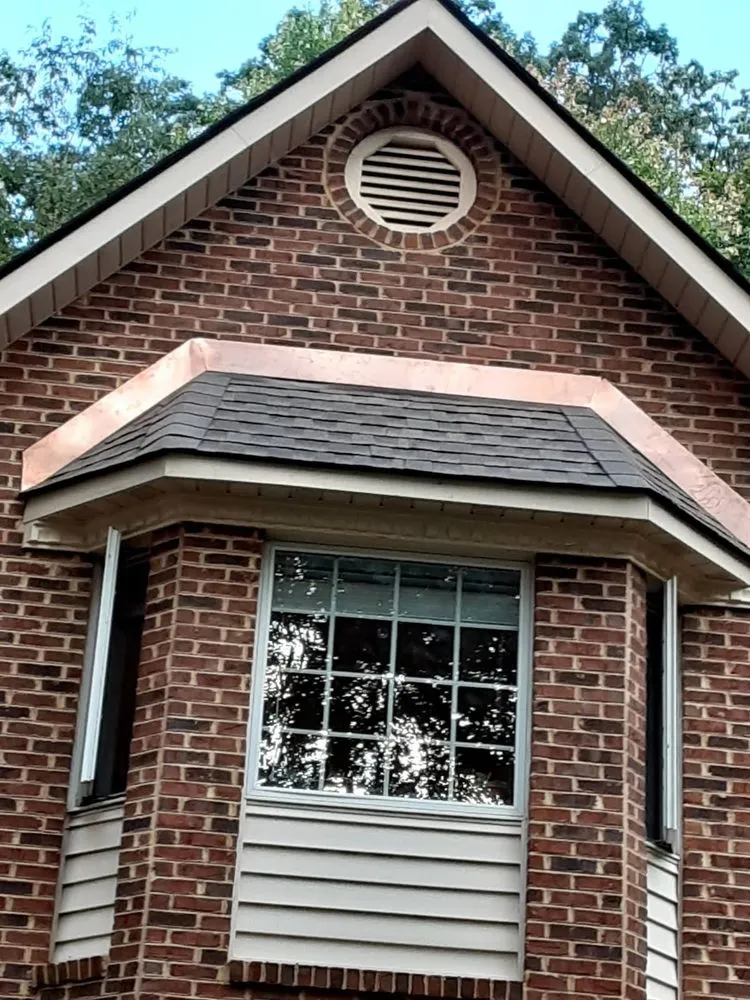 Slide of C & J Roofing