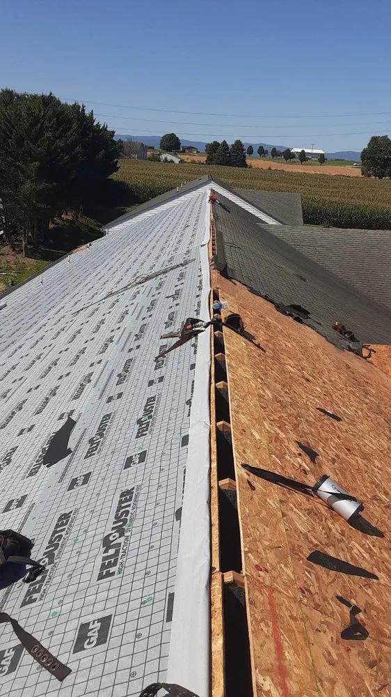 Slide of C & J Roofing