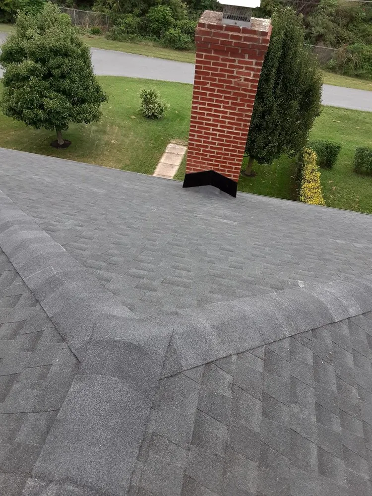 Slide of C & J Roofing