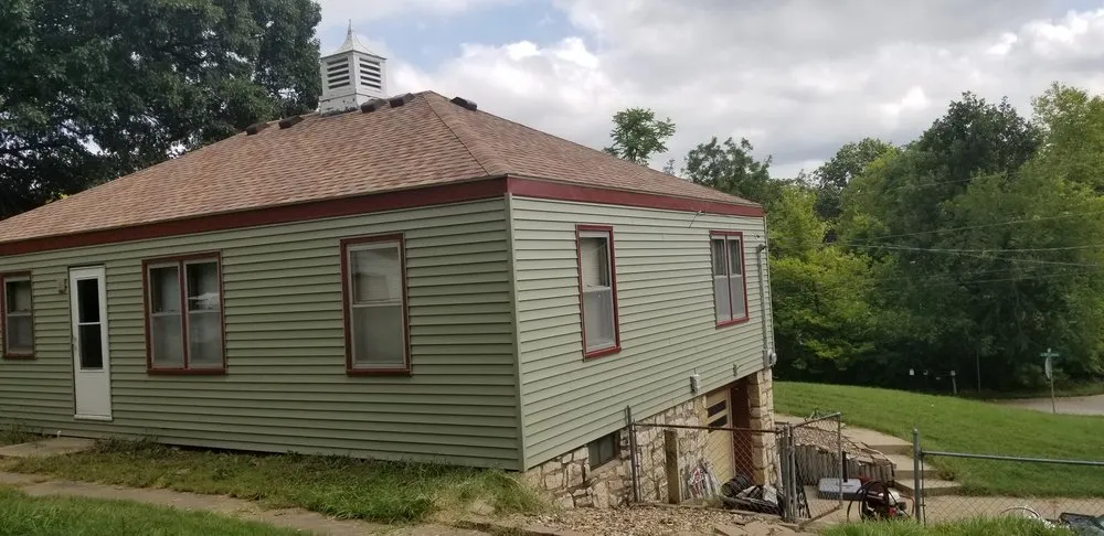 Professional residential roofing service in Freeman, MO by C & L Service Company