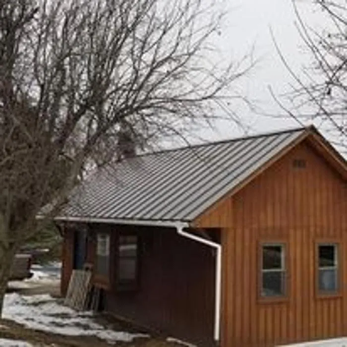 Emergency residential roofing service in Freeman, MO by C & L Service Company