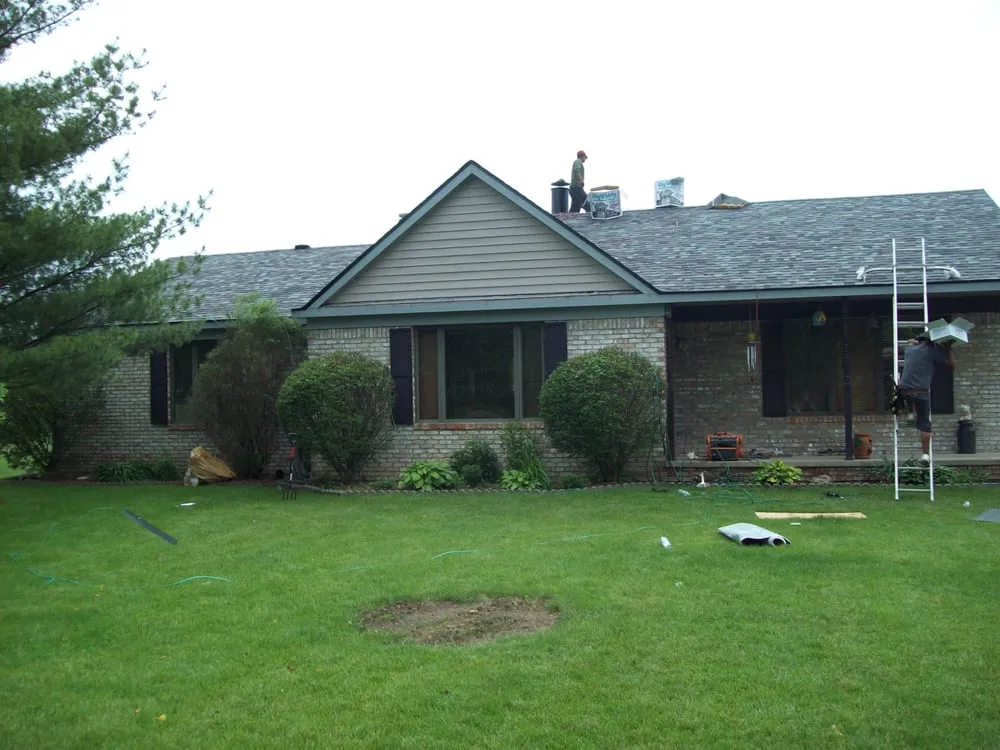 Slide of C & M Roofing