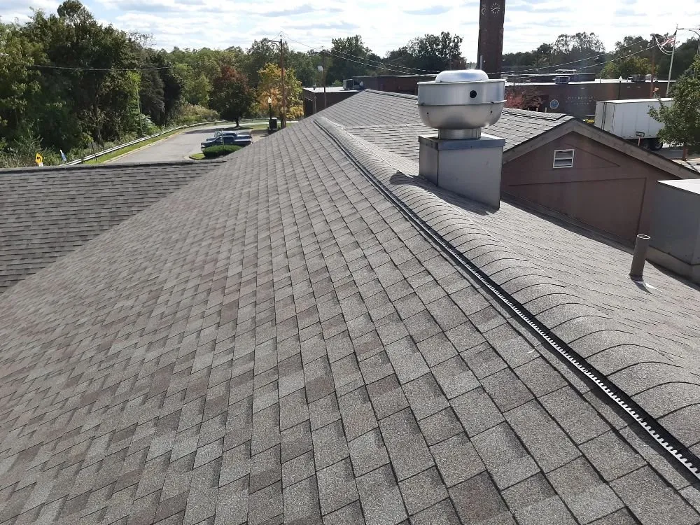 Slide of C & M Roofing Solutions