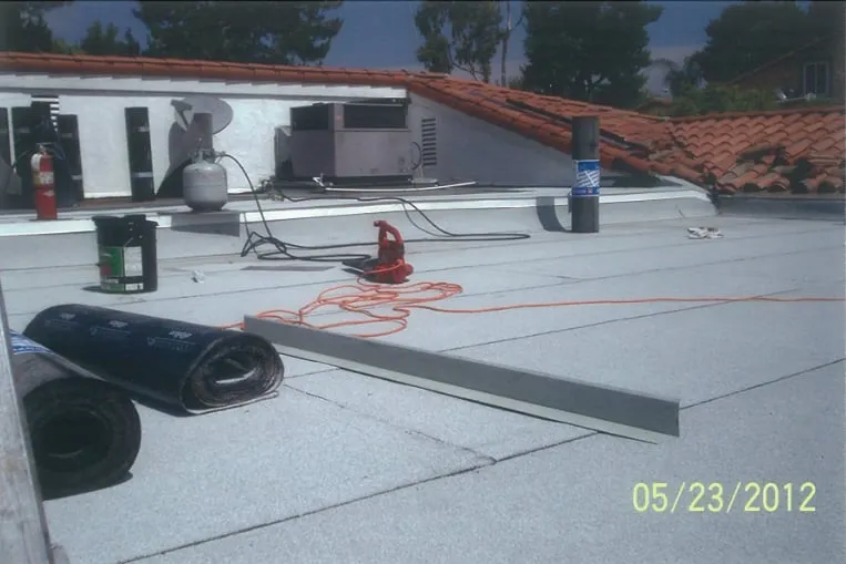 Slide of C B E Roofing