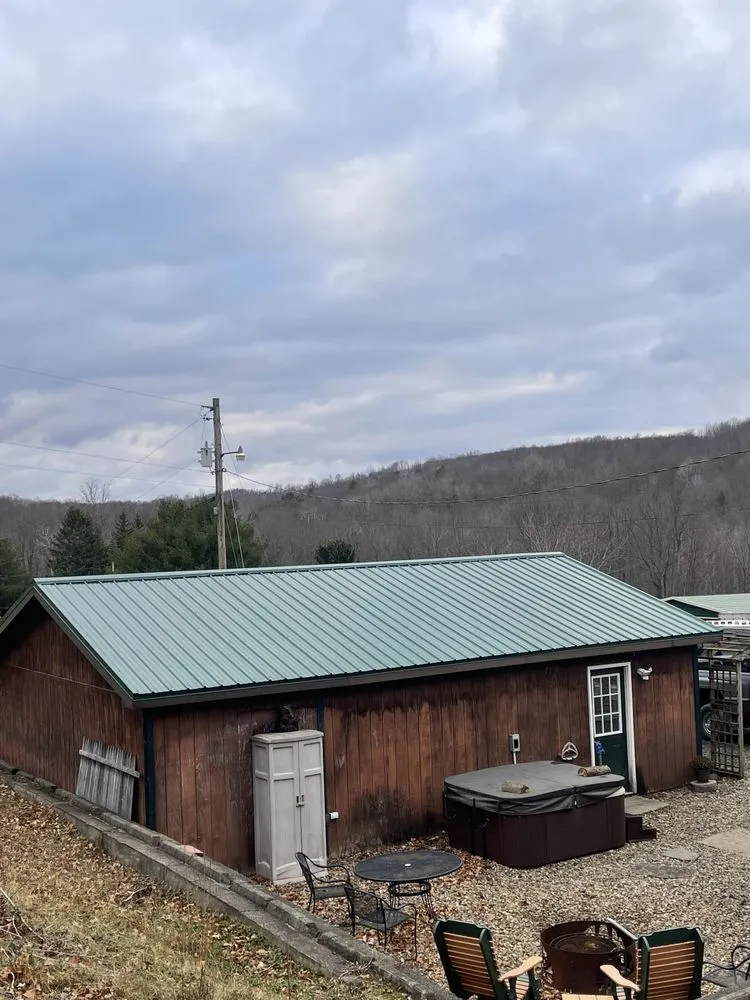 Top-rated storm damage roof repair same-day service in Granville Summit, PA by C G Roofing