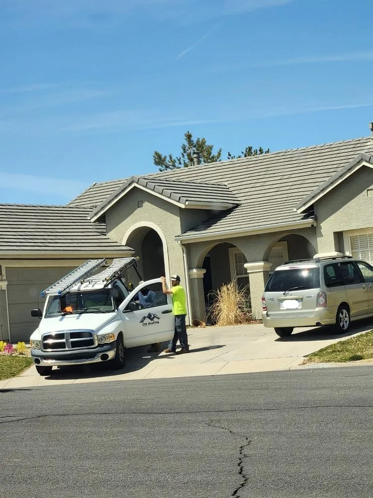 Slide of C T R Roofing