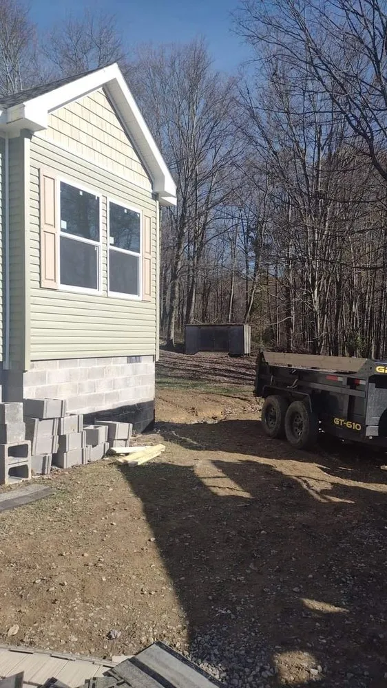 Top-rated metal roofing installation with free inspection in Tunnelton, WV by C W Construction