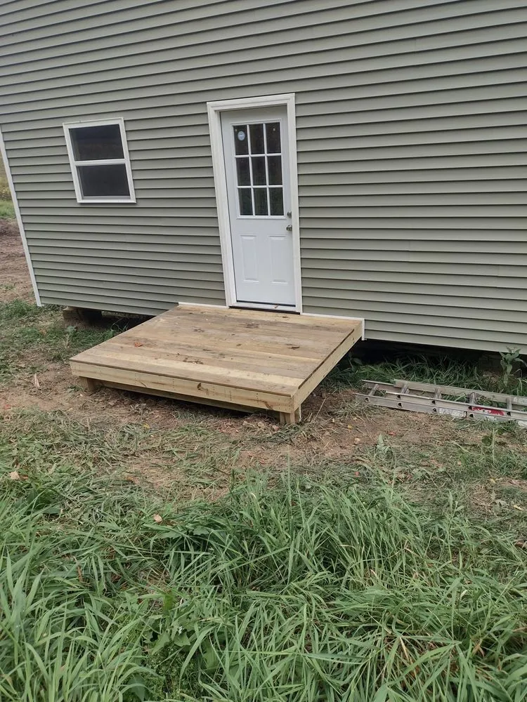 Expert shingle roofing service in Tunnelton, WV by C W Construction