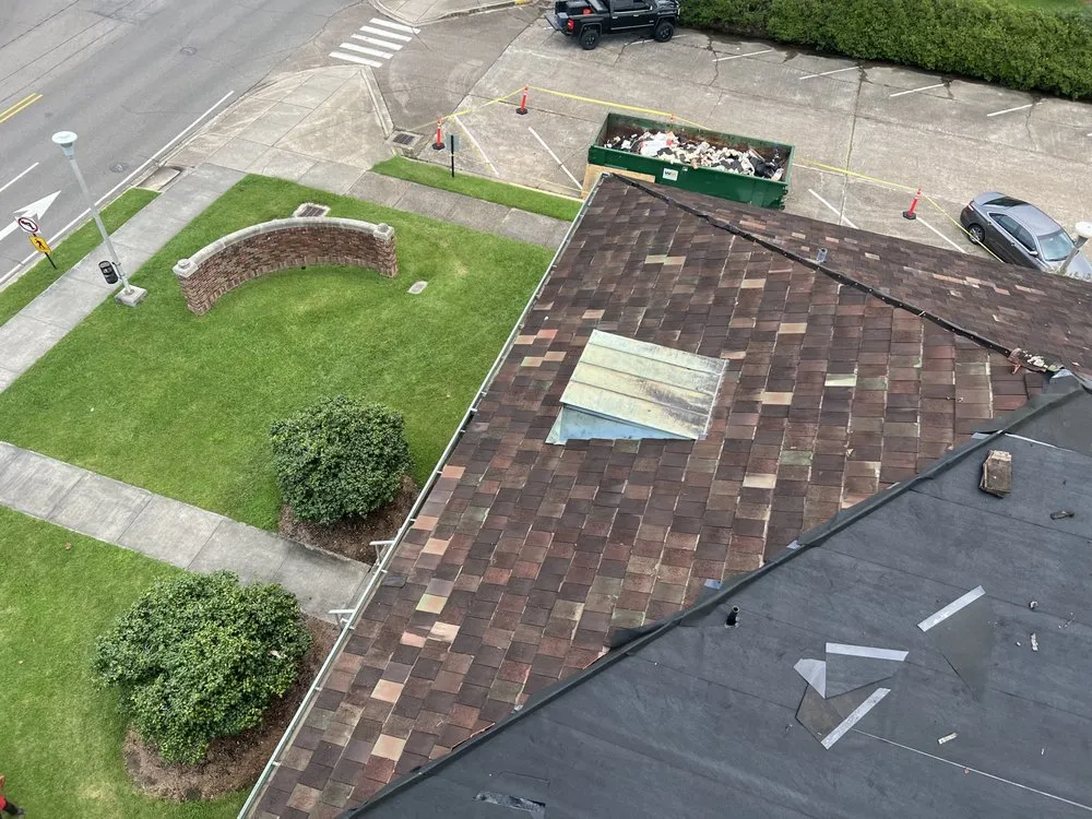 Slide of Caballeros Roofing