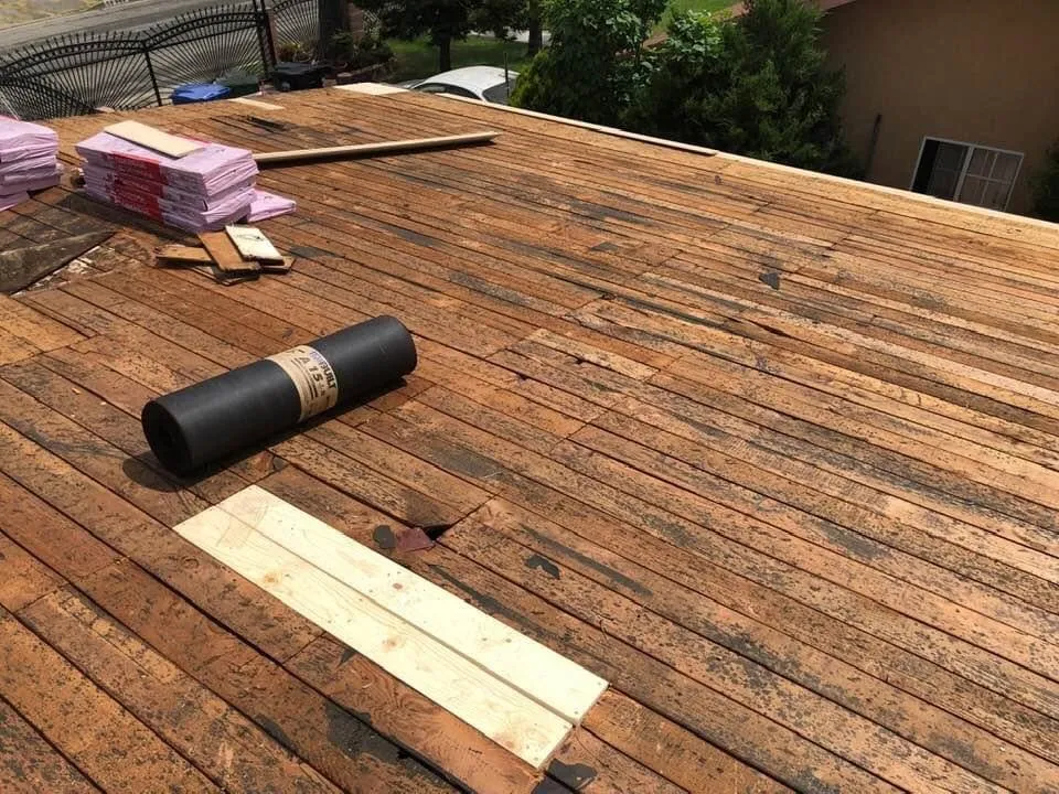 Slide of Caballeros Roofing