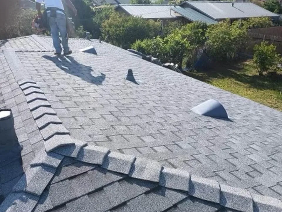 Slide of Caballeros Roofing