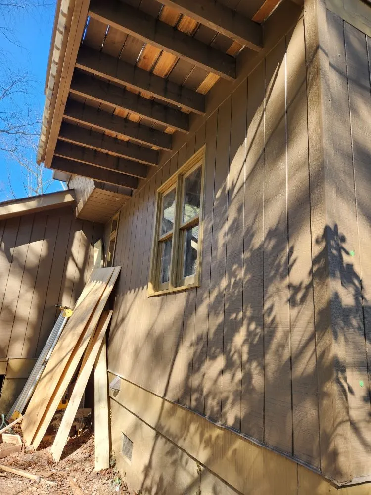 Slide of Cabin and House Repair Frank