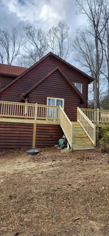 Slide of Cabin and House Repair Frank