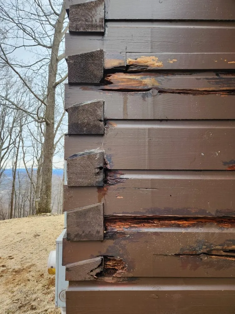 Slide of Cabin and House Repair Frank