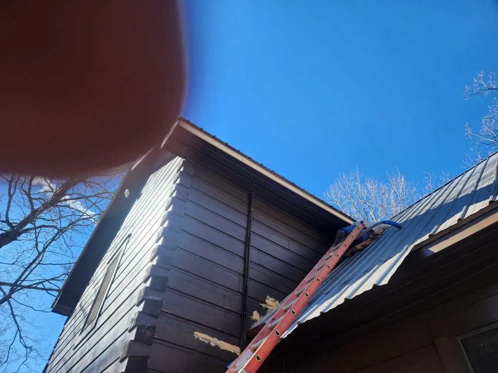 Slide of Cabin and House Repair Frank