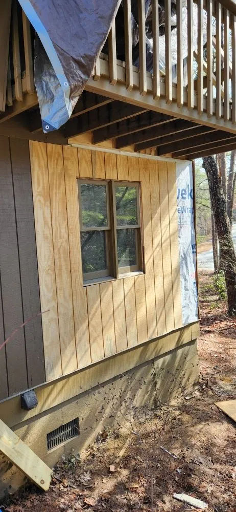 Slide of Cabin and House Repair Frank