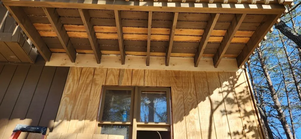 Slide of Cabin and House Repair Frank