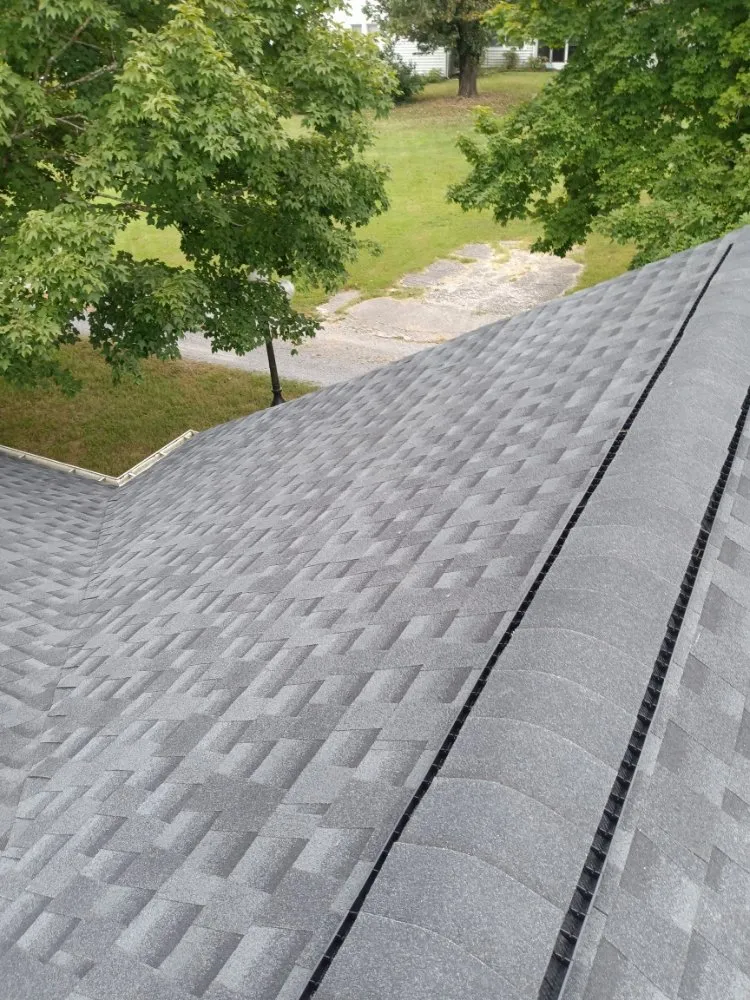 Slide of Caceres Roofing