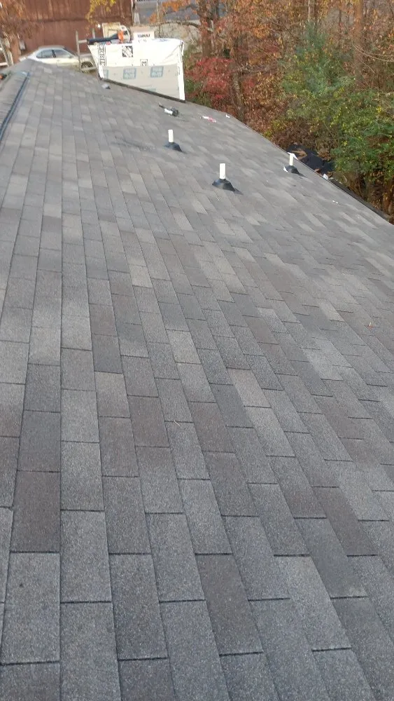 Slide of Caceres Roofing