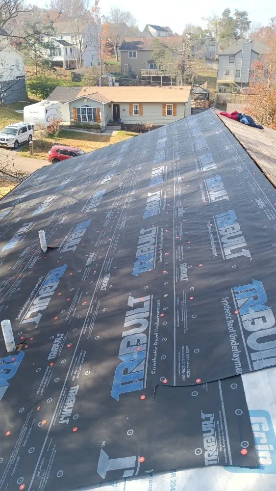 Slide of Caceres Roofing